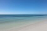 Witness the Atlantic Ocean at its calmest during midday at Bahia Honda State Park, captured to perfection in this elegant and minimalistic artwork.