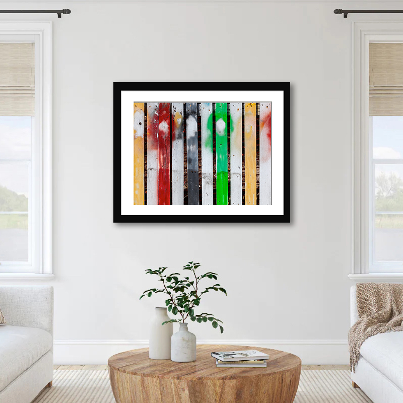 This print captures an old yet spirited picket fence in Key West, portraying a fun swatch of colors