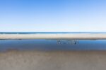 Discover the magical intersection of stone and sea with this evocative image, capturing a moment of tranquillity on the Oregon Coast.