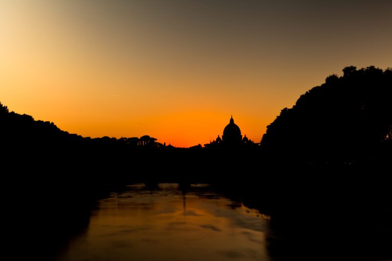 Silhouette of Rome's skyline at sunset