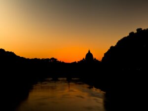 Silhouette of Rome's skyline at sunset