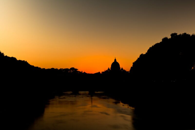 Silhouette of Rome's skyline at sunset