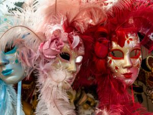 Close-up of colorful Venetian masquerade masks with intricate designs