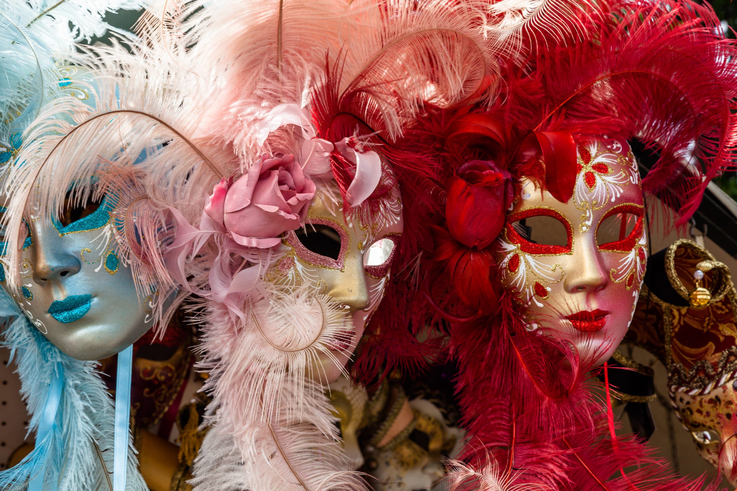 Close-up of colorful Venetian masquerade masks with intricate designs
