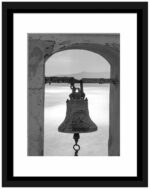 Ancient bell in black and white, overlooking the caldera in Santorini, Greece.