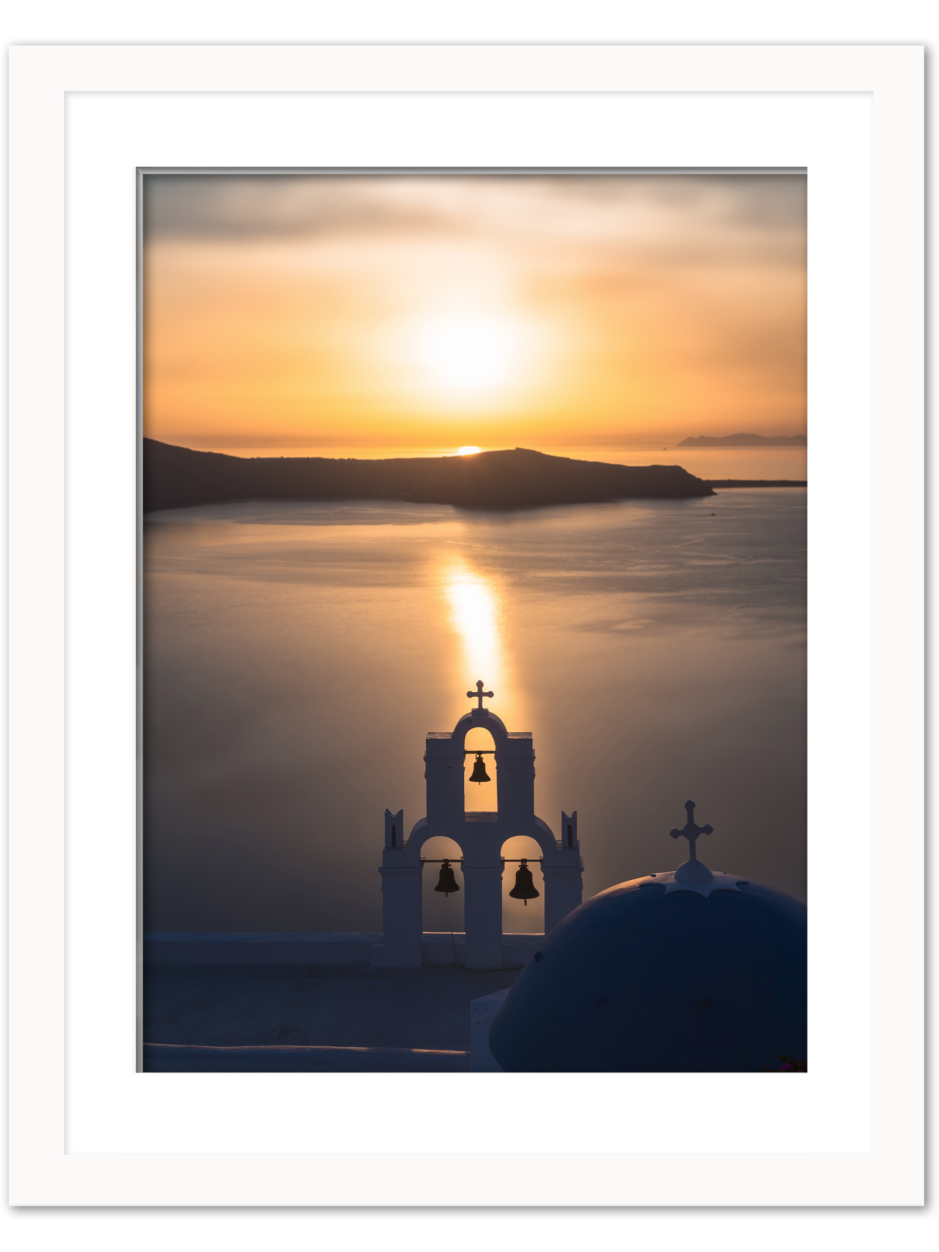 Church bells silhouette against a golden sunset in Santorini, Greece.